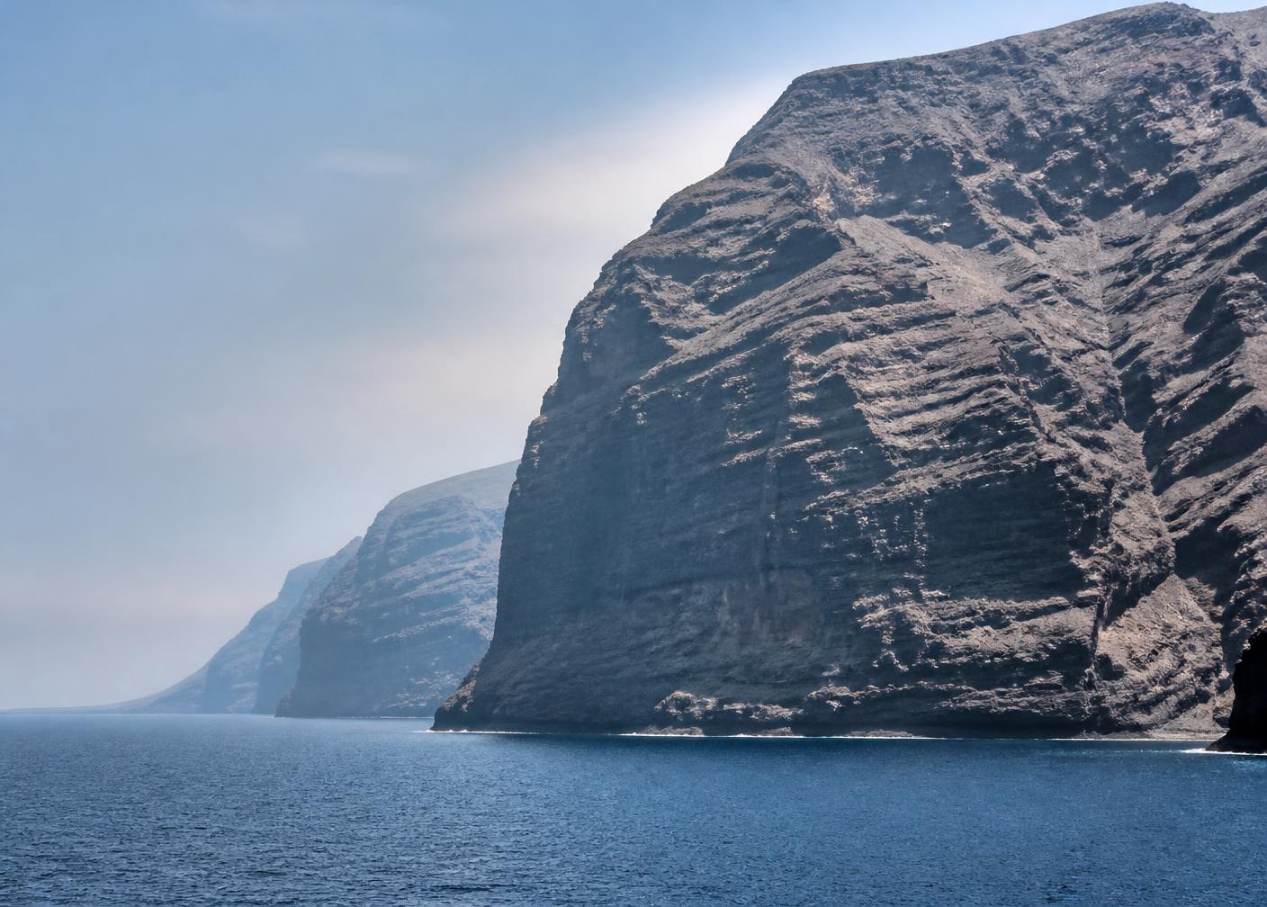 The towering basalt sea cliffs of Los Gigantes rising from the Atlantic